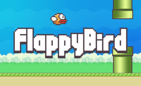 The bird is passing through the gap between the pipes in Flappy Bird